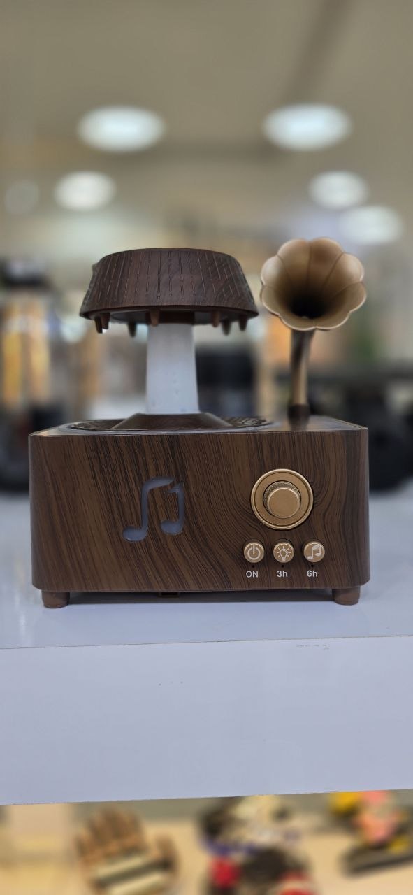 اسپیکر بلوتوث طرح گرامافون باران‌زا مدل V98 با بخور سرد و چراغ خواب رنگی